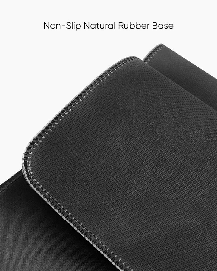 Black mouse pad with non-slip natural rubber base on a white background