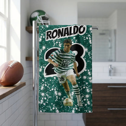Fridge with a towel featuring a soccer player and the number 23 in a kitchen setting.