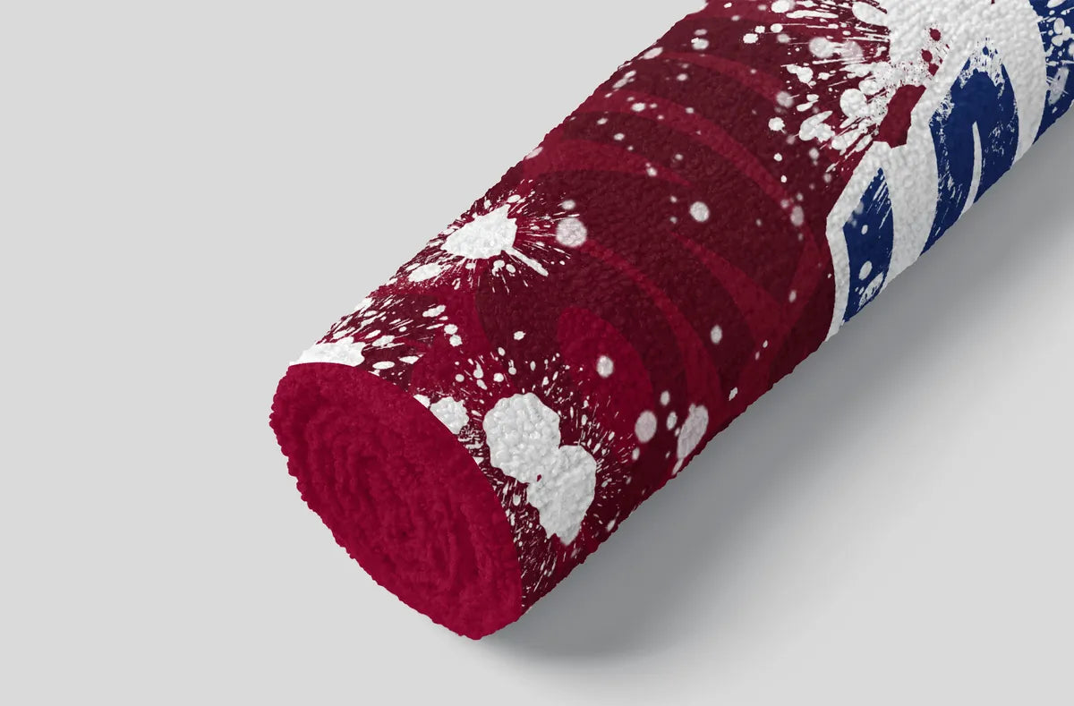Roll of red, white, and blue patterned paper on a gray background