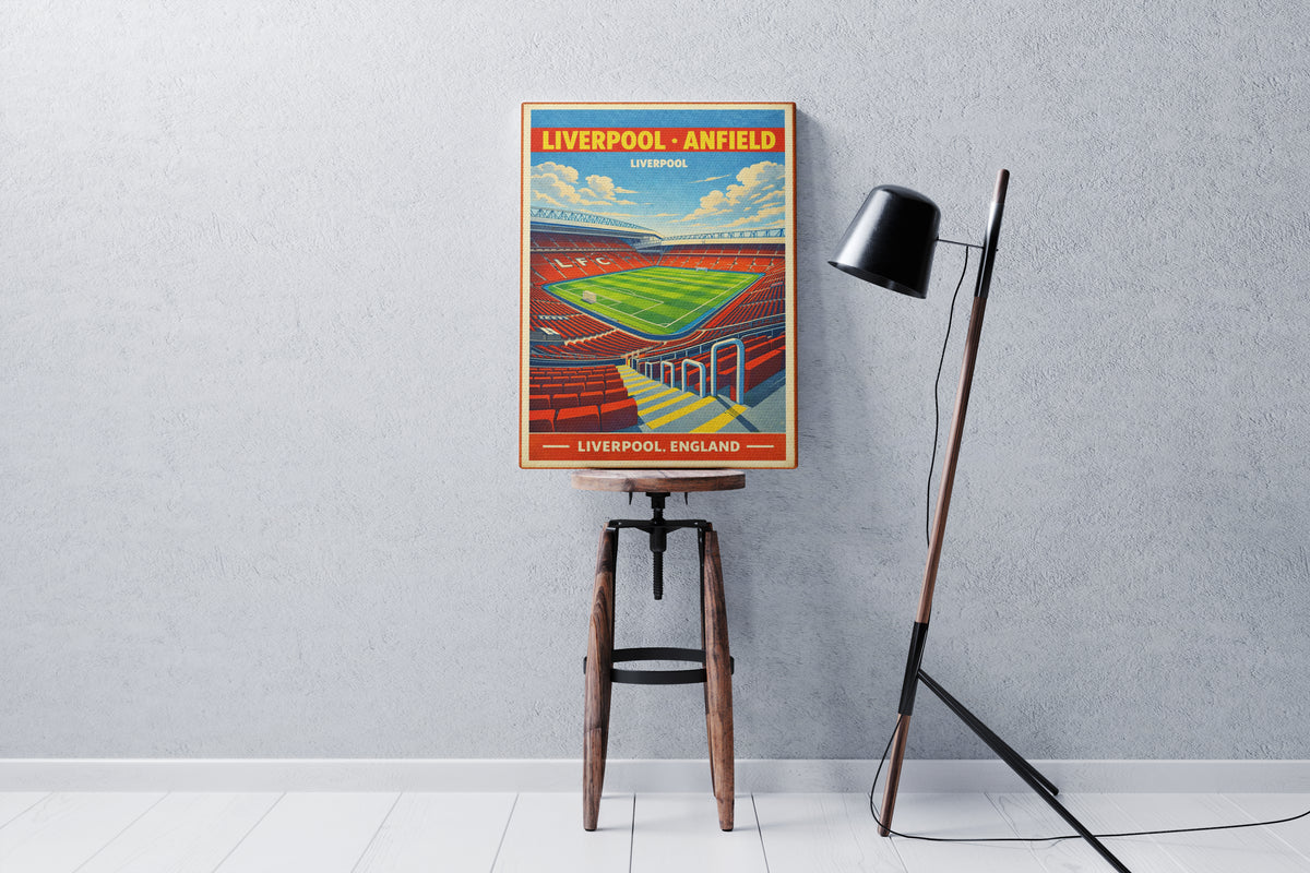 Poster of Liverpool Anfield stadium on a stool against a gray wall.