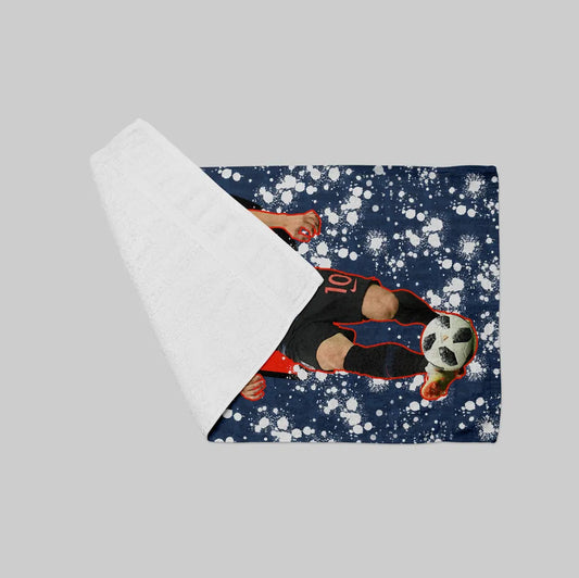 Foil wrap with a design of a person playing soccer on a blue background with snowflakes.