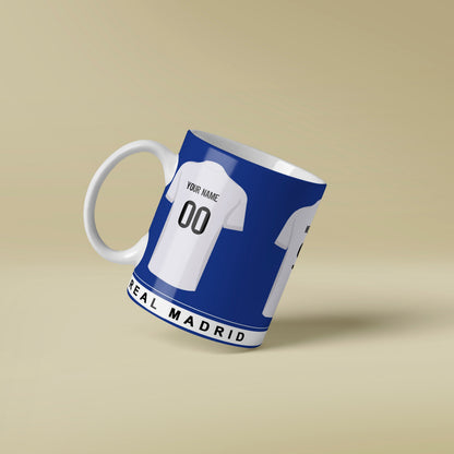 Mug designed like a Madrid soccer jersey on a beige background