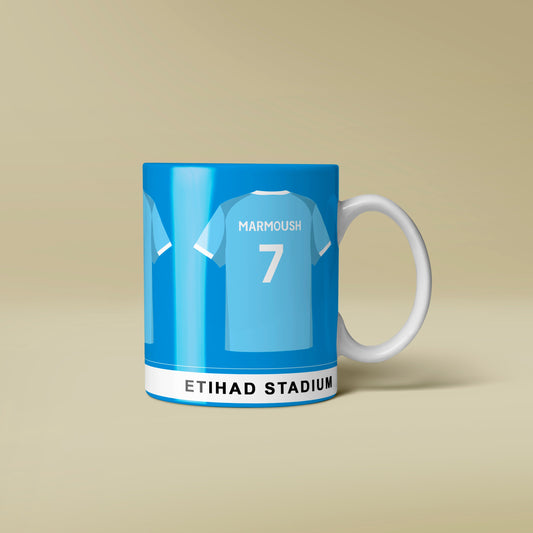 Mug with sports jersey design featuring 'Etihad Stadium' on a beige background