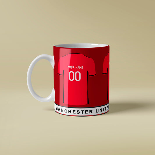 Red mug with Man United design on a beige background