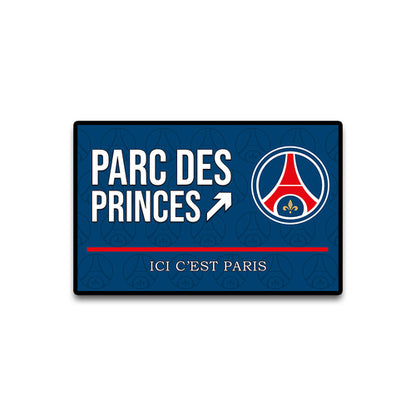 Rectangular sign with 'Parc des Princes' text and logo on a blue background