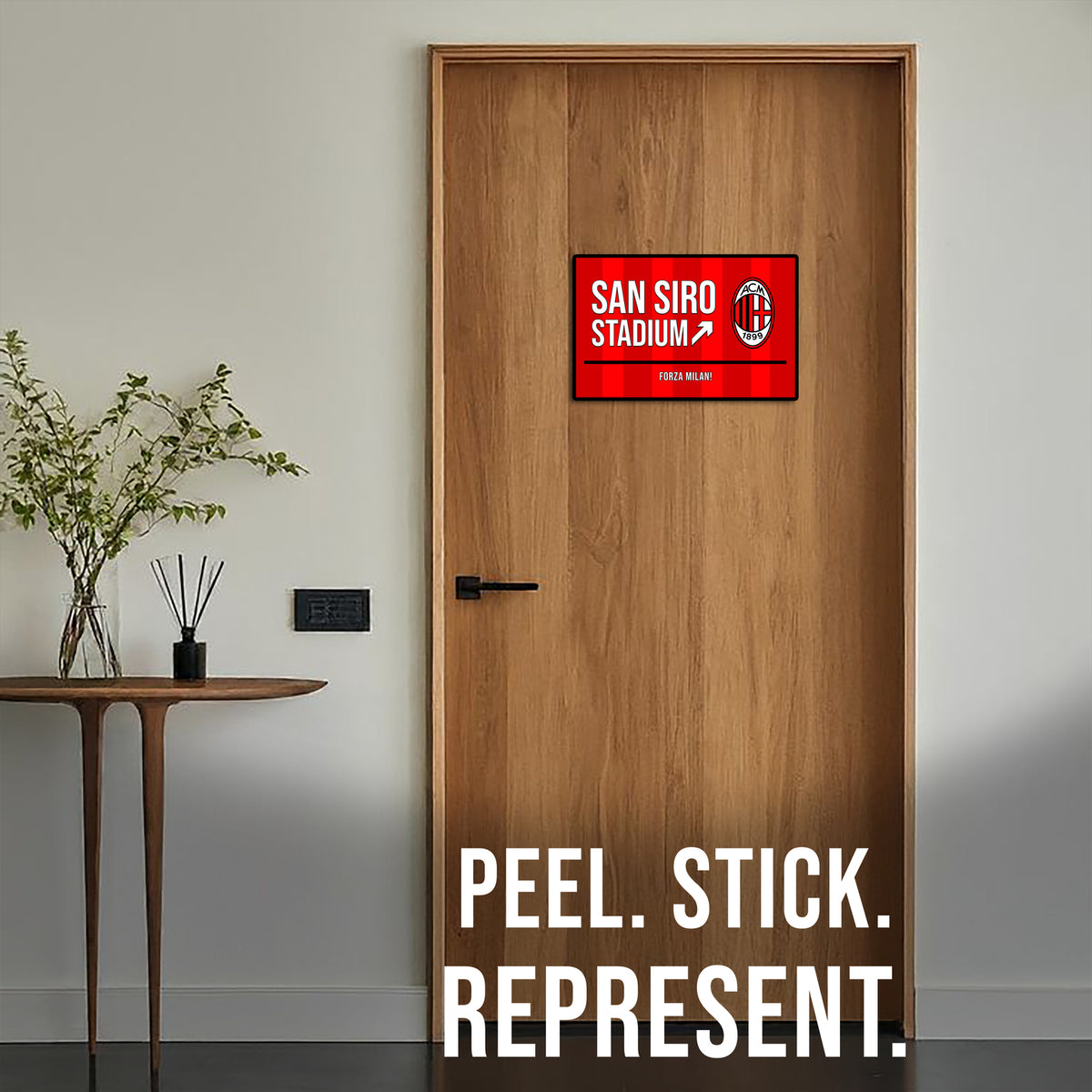 Wooden door with a red and white sign labeled 'San Siro Stadium' and text 'Peel. Stick. Represent.'.