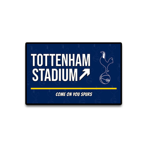 Navy blue sign with 'Tottenham Stadium' and Spurs logo on a white background