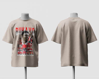 Beige t-shirt with graphic design on a mannequin against a white background
